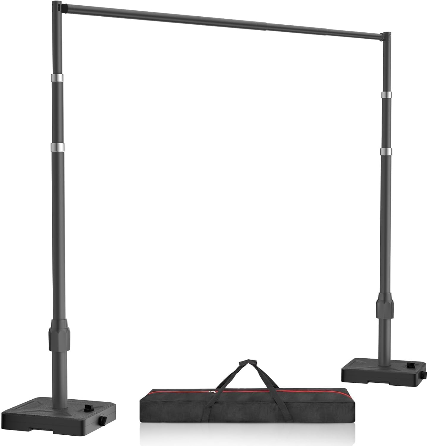 Black adjustable backdrop stand with two rectangular water tank bases and a black carrying bag.